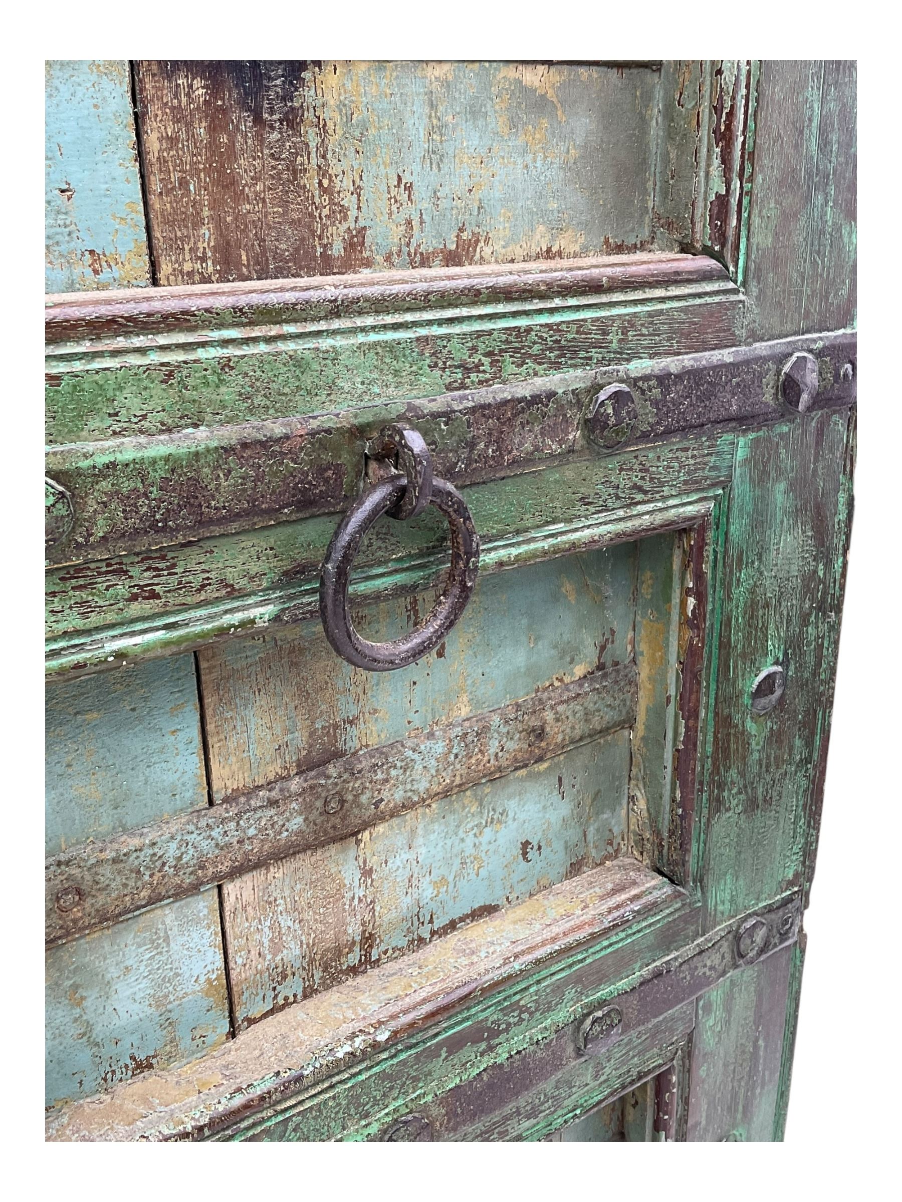Pair of green-painted Indian doors, c.1860–1880, made from solid teak featuring original iron work and hand-painted finish
