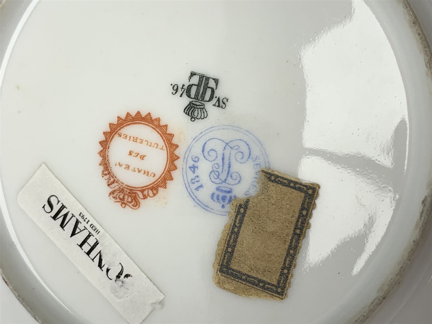 Mid 19th century Sevres Louis Philippe period porcelain cabinet plate, decorated with central Louis Philippe crowned monogram flanked by two cherubs, within cobalt gilt detailed border, with date mark for 1846, red inventory mark for Chateau des Tuileries, and blue monogram mark , D14.5cm