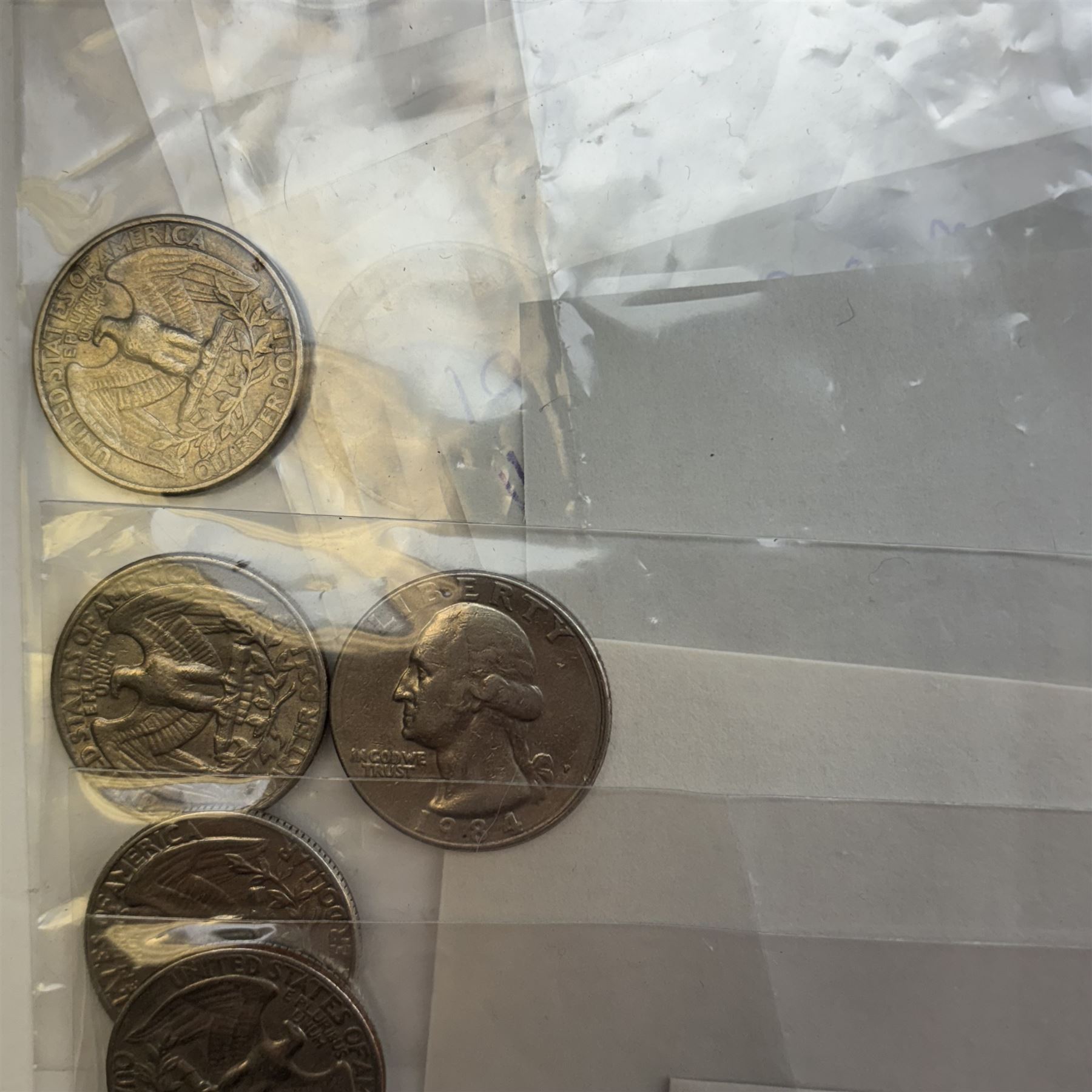 Collection of United States of America coins, 1965 onwards, principally quarter dollars, many with alleged minting errors as annotated on labels