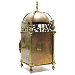 English-17th-century style replica 8-day lantern clock with a suspended bell and turned finials, with three ornate frets to the front and sides and opening side and rear doors, with an engraved dial centre and formerly silvered chapter with engraved Roman numerals, inner quarter hour track and period steel hands, dial engraved 