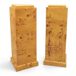 Art Deco style pair of burr walnut pedestals, rounded square top raised on a plinth base