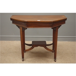  Early 20th century octagonal shaped mahogany folding games table, green baize, corner fret work brackets, square tapering supports with sabre stretchers joining undertier, W90cm, H71cm, D86cm, (maximum measurements)  