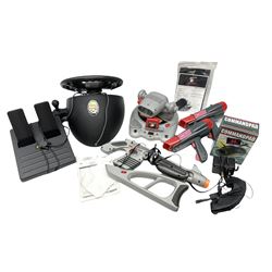 Mad Catz Dual Force Racing Wheel and Foot control for Playstation; Arcadia Image Projecting Game System; pair of Captain Scarlet and the Misterons phaser guns etc