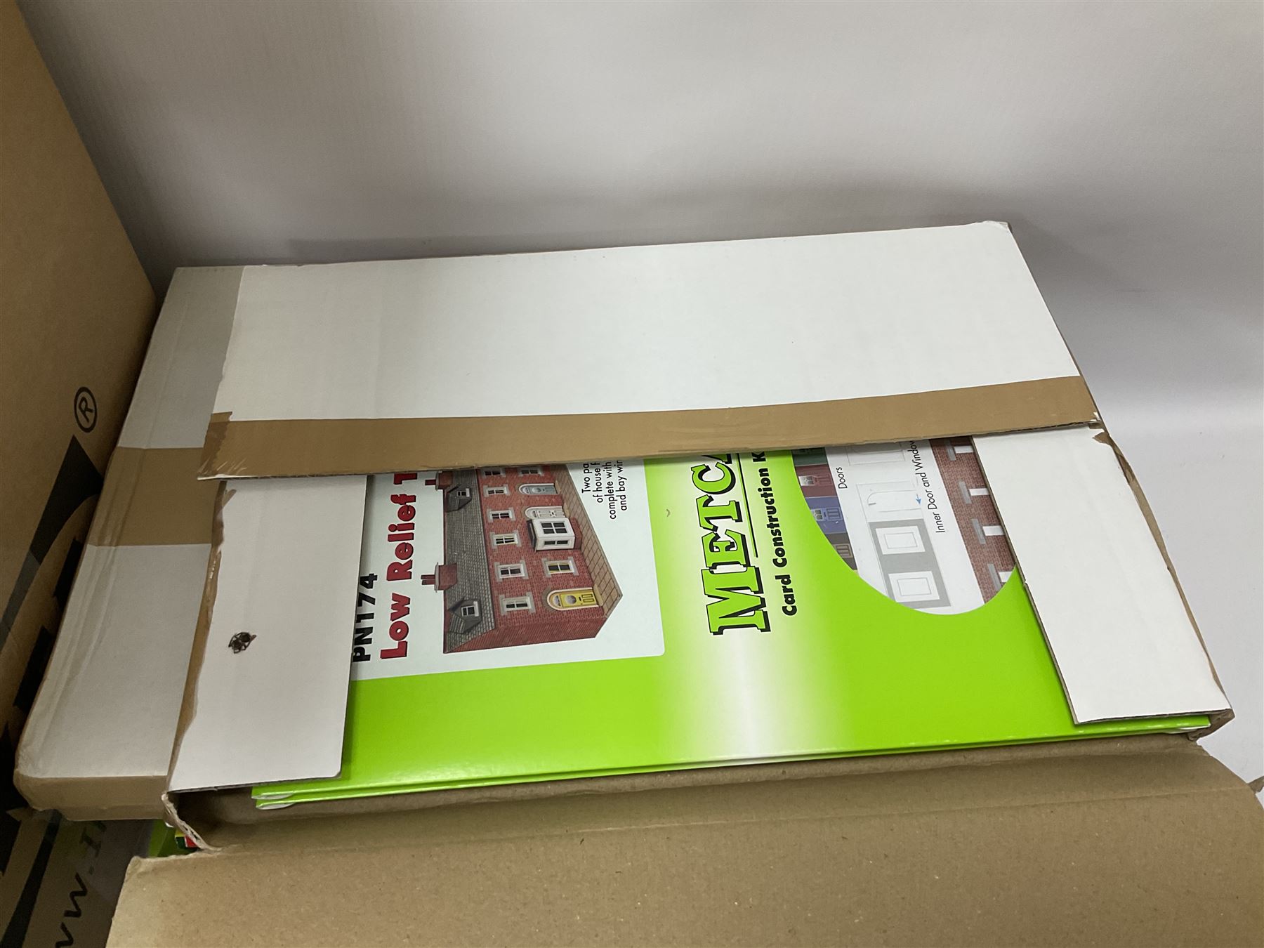 Extensive collection of scratch built buildings for use on ‘00’ gauge model railway layout, small amount of accessories and tools with a quantity of railway magazines and leaflets, in three boxes 