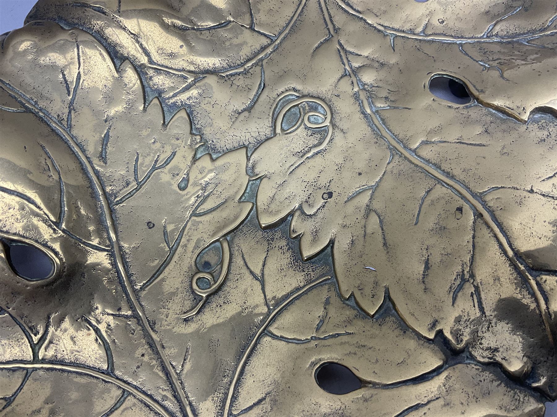 Late 19th/early 20th century twin handled brass centrepiece dish in the form of oak leaves, raised upon four legs, L37cm