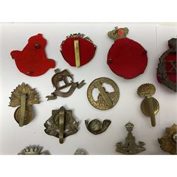 Over thirty regimental cap badges for fusiliers, Yorkshire interest, Light Infantry etc including Royal Scots and Welsh fusiliers, Durham L.I., KO Yorkshire L.I., Oxford & Bucks L.I., Green Howards, East Yorkshire, West Riding, York North Riding etc 