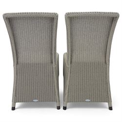 Neptune – Sheldrake limed oak extendable dining table and eight Havan loom chairs, the oval top in limed oak finish with four additional leaves extending the table to seat up to ten (Extends to cm), raised on turned legs with two additional centre supports, the matching Havan loom chairs finished in grey with cream upholstered seat covers (H 95cm, W 47cm, D 55cm)