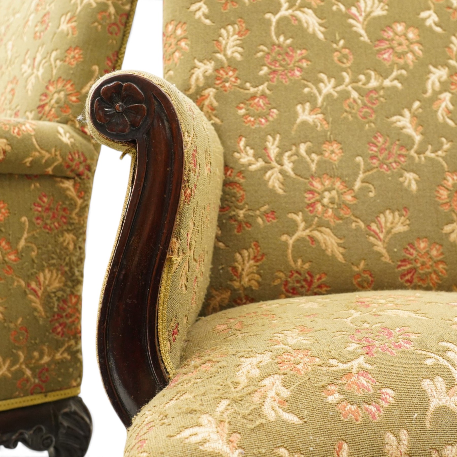 Pair of Chippendale design carved mahogany framed armchairs of stylised lyre form, high square backs and sprung seat upholstered in olive-ground foliate fabric, scrolled arm terminals with applied rosettes, the seat rail moulded with central scallop-and-acanthus motif, raised on shell-carved cabriole supports with ball-and-claw feet