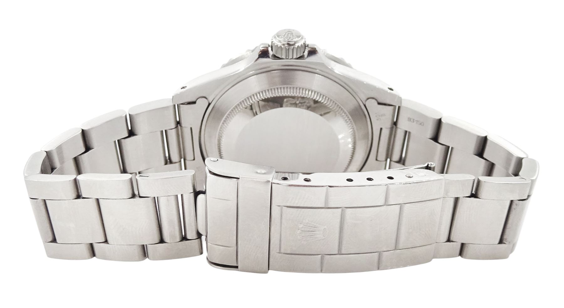 Rolex Oyster Perpetual Submariner Date stainless steel  automatic wristwatch, Ref. 16610, Serial No. L438272, black dial with luminous filled dot hour markers, baton quarters, white outer minute divisions, magnified date aperture at 3, polished Mercedes hands with luminous inserts, on Oyster stainless steel bracelet, with fold-over clasp