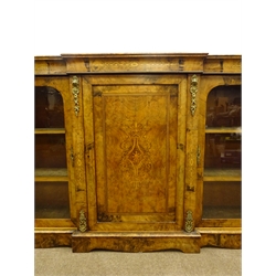  Victorian inlaid figured and burr walnut breakfront credenza, central panel door inlaid with satinwood scrollwork, enclosed by two glazed doors, cast ormolu mounts and boxwood inlay, on a skirted base W181cm, H111cm, D38cm  