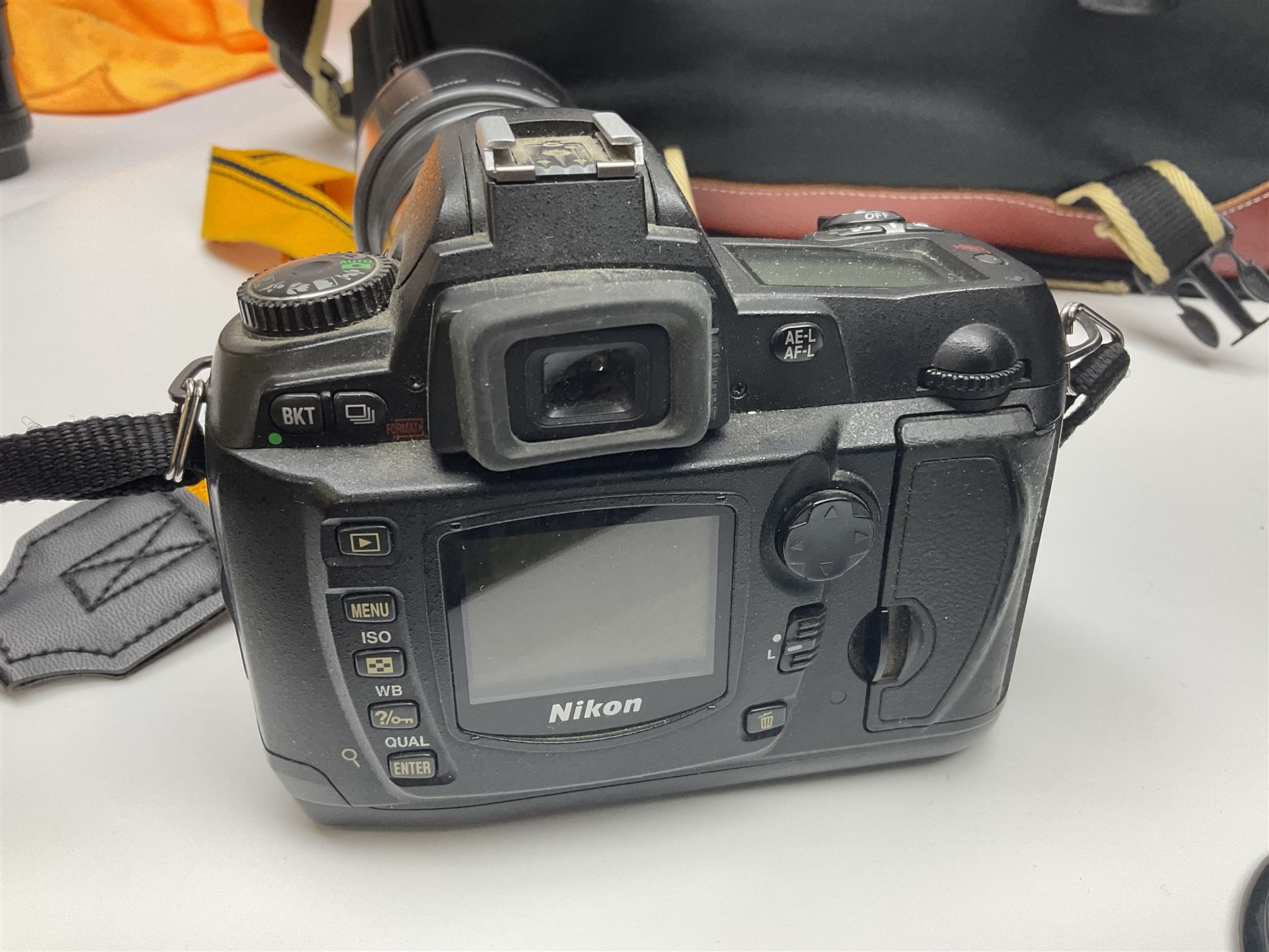 Four camera bodies, to include, Ricoh KR-10 serial no. 38826, Pentax MZ-M serial no. 4185969 with 'SMC Pentax- M 1:3.5 28mm' lens, Canon EOS500 serial no. 080927, with 'Sigma Zoom 100-300mm 1:4.5-6.7 DL'  lens etc, with other camera lenses and equipment 