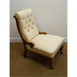  Victorian walnut framed spoon back armchair, carved cresting rail, upholstered in buttoned beige fabric, serpentine fronted seat, cabriole legs on castors (W63cm) and an oak framed armchair upholstered in matching material (W63cm) (2)  