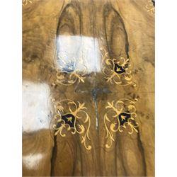 Victorian inlaid walnut oval loo table, five turned columns on carved shaped supports