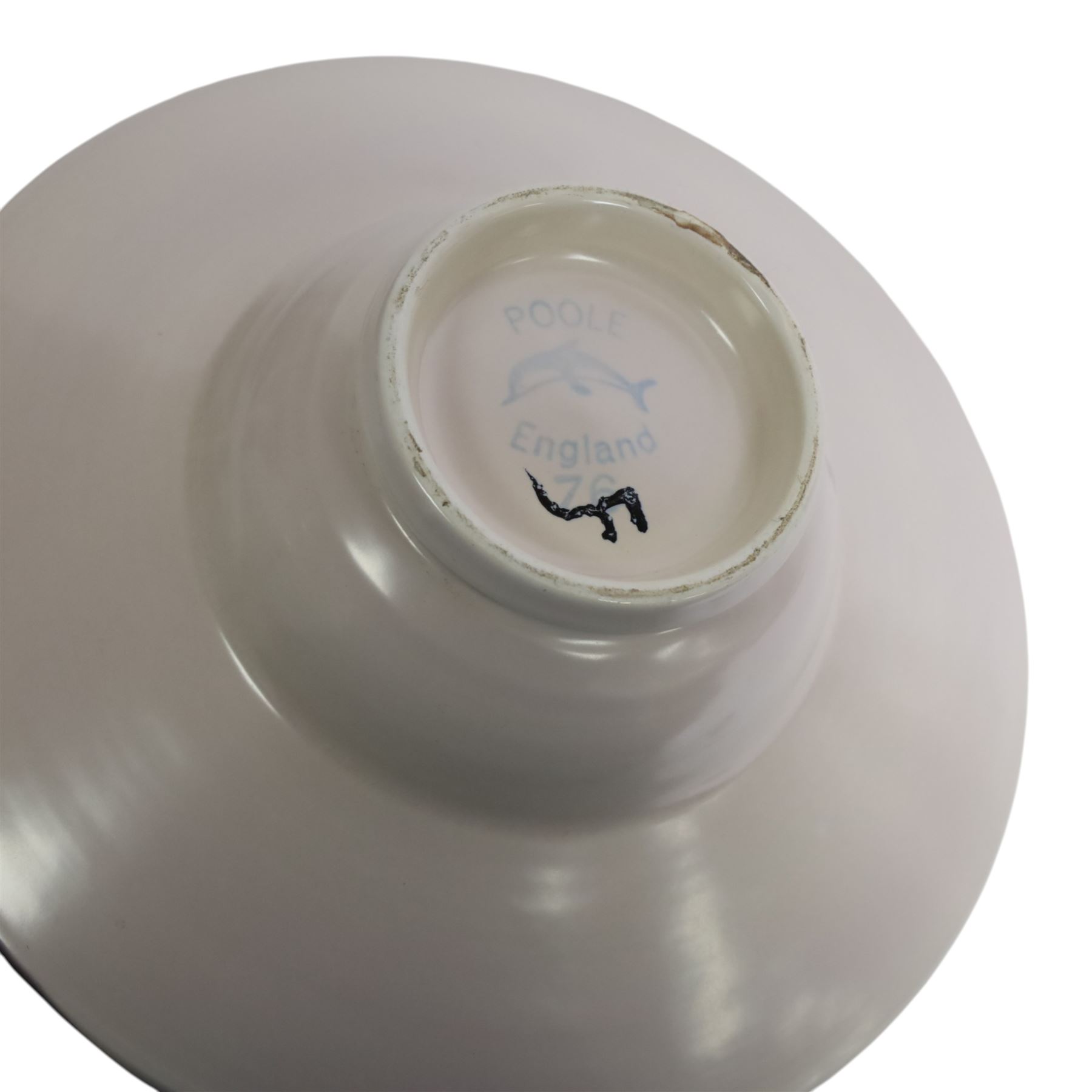 Poole pottery, Delphis Volcano pedestal dish, Delphis charges, in blues and black on a red ground, shape four and another plate, pedestal dish D23cm 