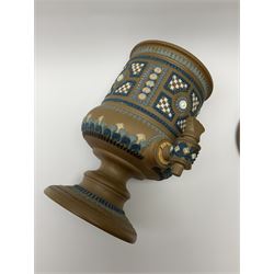 A late 19th century Doulton Lambeth stoneware water filter with original spigot, decorated with relief moulded foliate bands, with impressed marks and monogrammed for Laura Gooderham beneath, H34cm. 