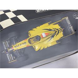 Three Minichamps 1:18 scale die-cast racing cars - Jordan Mugen Honda 198 D. Hill; Jordan Ford EJ13 G. Fisichella; and Stewart Ford SF 1 R. Barrichello; all boxed (3)
