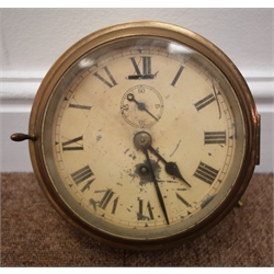  Early 20th century brass bulkhead clock, circular Roman dial with subsidiary seconds dial, single train driven movement, D19cm  