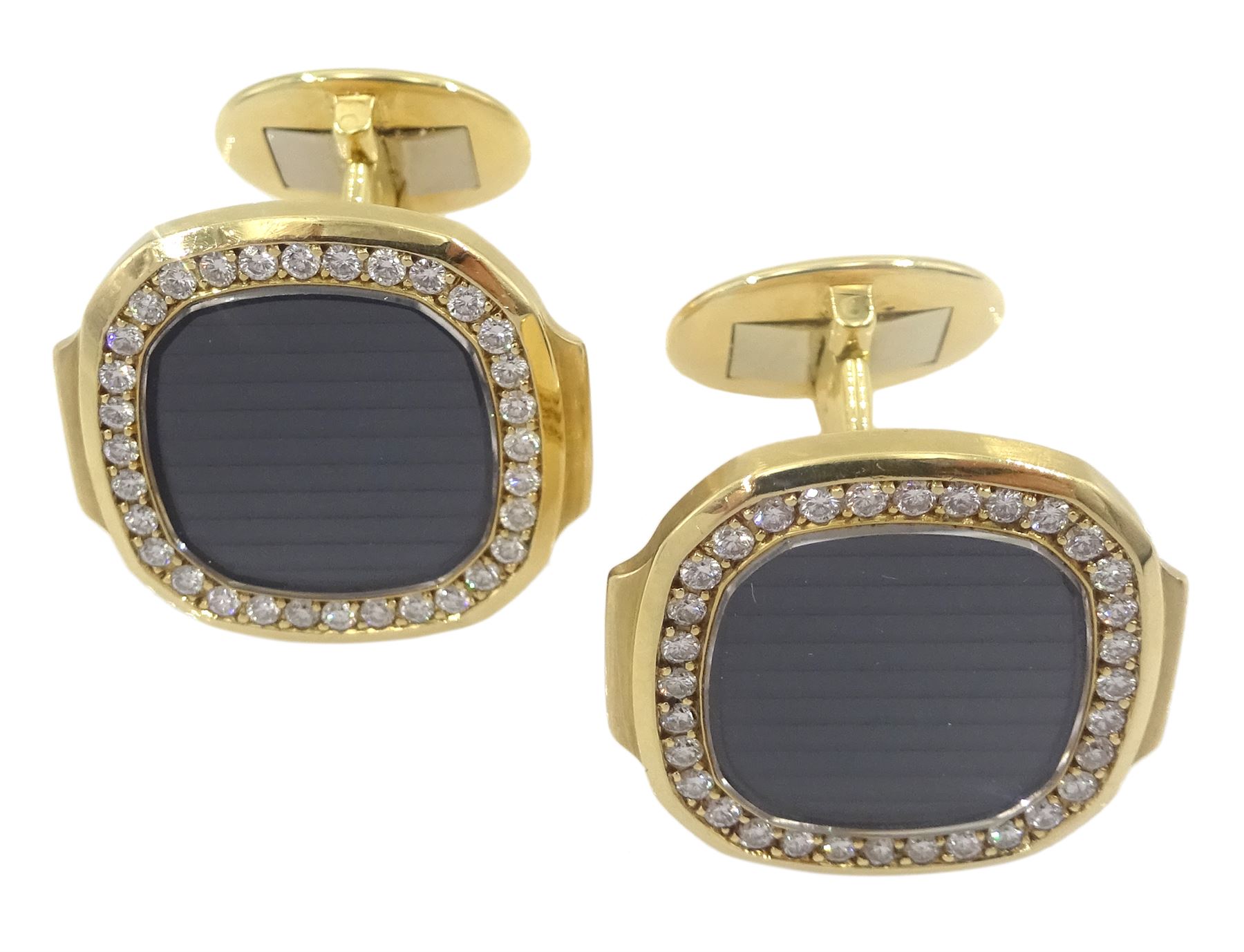 Pair of Patek Philippe Nautilus 18ct yellow gold and diamond cufflinks, with sapphire crystal, black-grey centre and diamond-set front, hallmarked, in original box