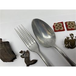 WW2 German Luftwaffe Mess cutlery comprising table spoon and fork, each with H.M.Z.38 mark; WW1 British War Medal awarded to L-13858 Gnr. J. McCabe R.A.; and small quantity of military badges, rank pips etc