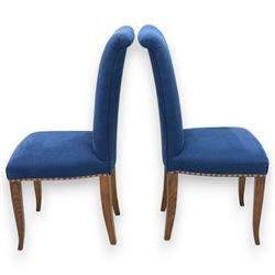 Contemporary set of four blue high back upholstered dining chairs