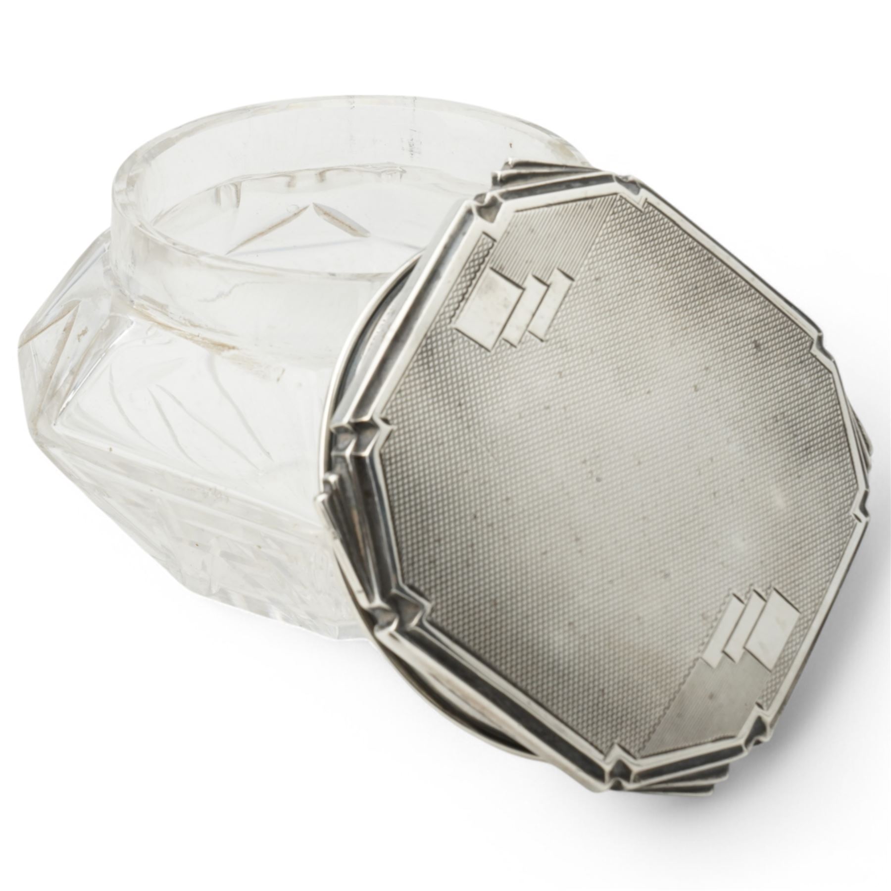 Silver circular teapot on short pedestal foot London 1932 and a glass powder bowl with silver cover Sheffield 1933