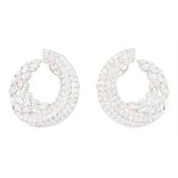 Pair of 18ct white gold marquise cut and pave set, round brilliant cut diamond crescent stud earrings, stamped, total diamond weight approx 9.30 carat