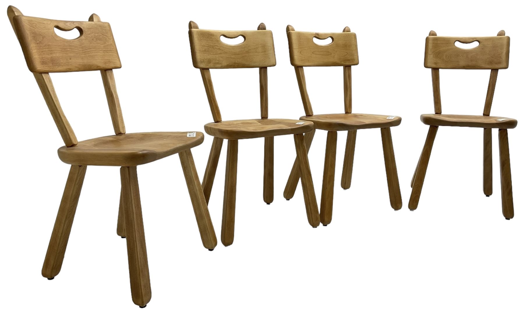 Imperial Canada - set of four mid-20th century birch dining chairs, bar back with pierced handle, dished seat on square tapered splayed supports