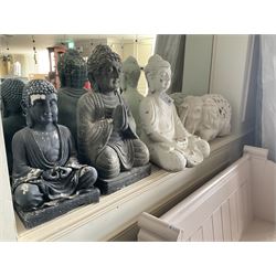 Three cast seated Buddhas and an elephant (4)- LOT SUBJECT TO VAT ON THE HAMMER PRICE - To be collected by appointment from The Ambassador Hotel, 36-38 Esplanade, Scarborough YO11 2AY. ALL GOODS MUST BE REMOVED BY WEDNESDAY 15TH JUNE.