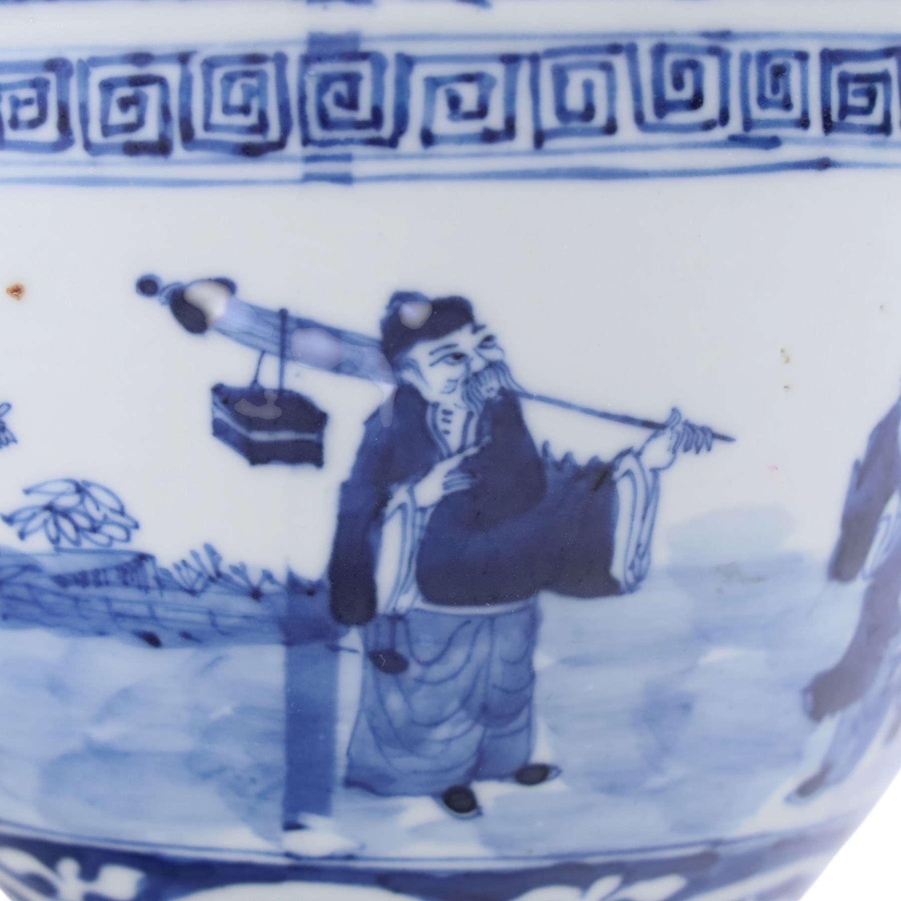 Pair of blue and white moulded vases, decorated with dragons amongst clouds, together with two blue and white planters painted, the first decorated with pagodas within a landscape scene, the other with musicians, vases H26cm 