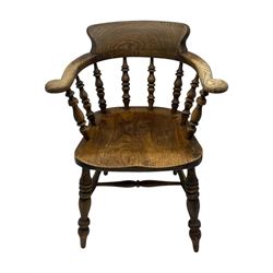 19th century elm and beech smoker's bow armchair, shaped arms over turned spindle gallery and dished seat, on turned supports united by double H-shaped swell turned stretchers 