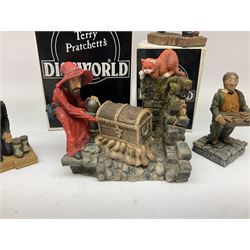 Terry Pratchett Discworld figures, designed by Clarecraft, comprising Rincewind and Luggage bookend DW41, Imp Y Celyn, DW81, C.M.O.T Dibbler, DW35, Rincewind, DW01 and Susan Sto Helit, boxed, DW77
