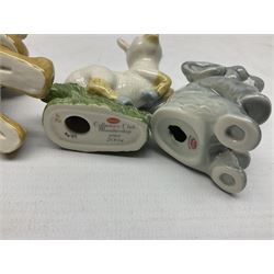 Nine Wade Collectables figures, comprising six Myths and Legends; King Canute, Mermaid, St George, Cornish Tin Mine Pixie, Puck and Green man, together with Lamb, Elephant and bear, a Wade Panda money box and two boxes of Wade Christmas Crackers