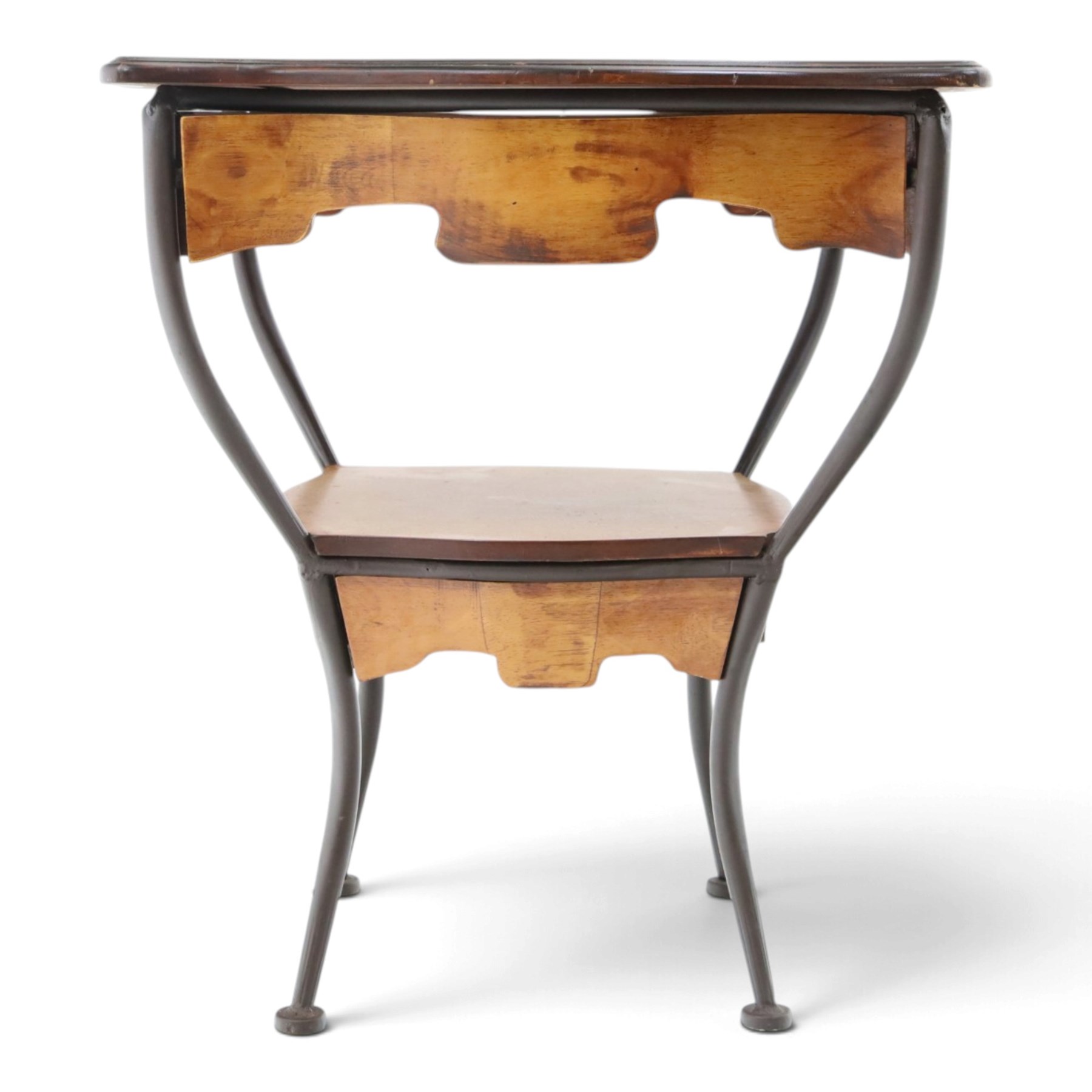 Art Nouveau style occasional table, serpentine shaped top with dark moulded edge, shaped apron and lower shelf, raised on four curved metal supports