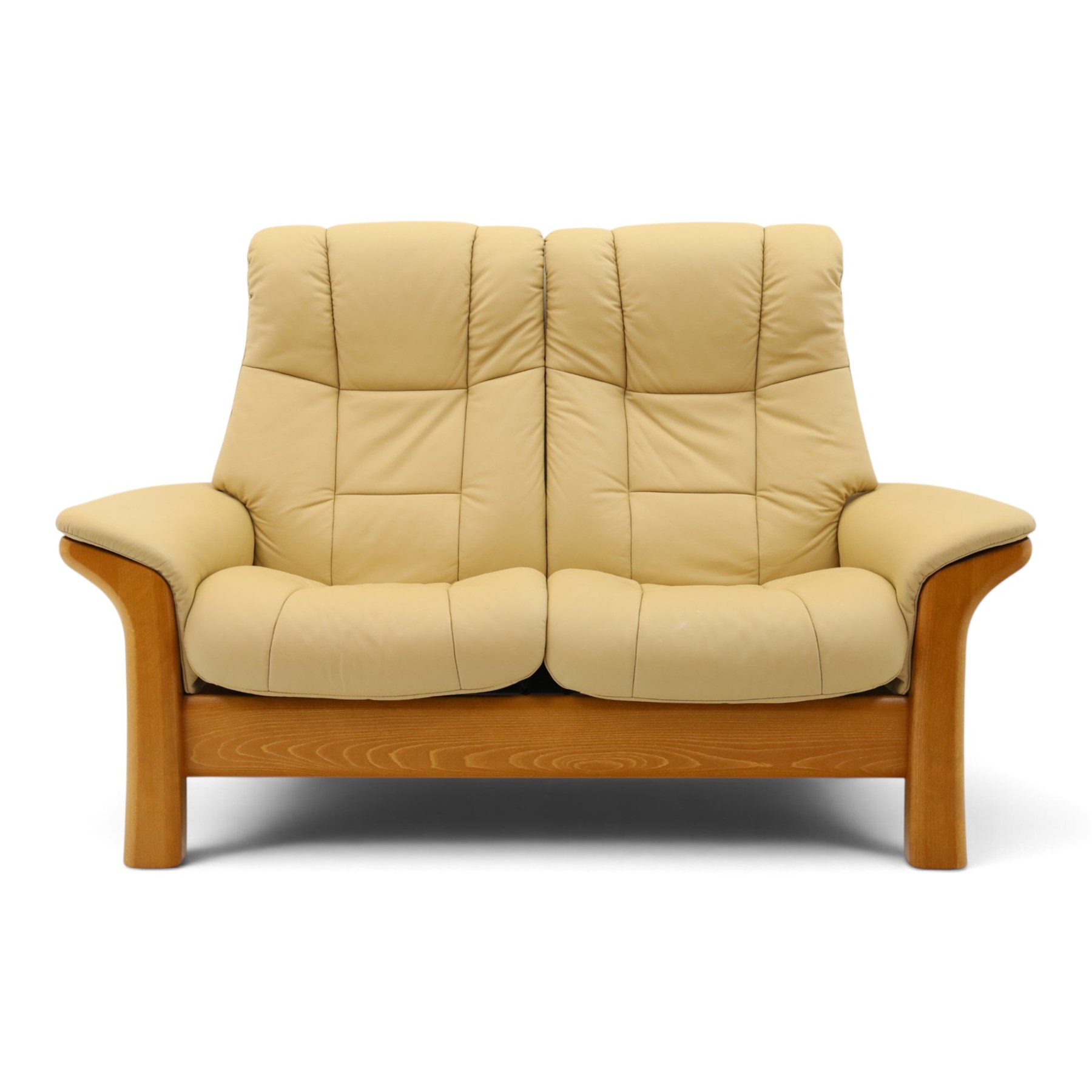Ekornes Stressless - beech framed reclining two seater sofa, out-swept arms over tapering supports, upholstered in beige leather