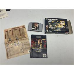 Nintendo 64 console, two controllers, games and accessories. Accessories to include the ‘Tremorpak’ and ‘Spook’ 2 Phono plugs and a S-VHS plug with adapter, both in original boxes. Games to include ‘Golden Eye 007’, ‘Doom 64’, ‘Killer Instinct Gold’, ‘Tetrisphere’, ‘F-1 World Grand Prix’, ‘Pilotwings 64’ and ‘Lylatwars’ with ‘Rumble Pak’, all with original boxes and instruction manuals. ‘Star Wars Episode I Racer’ game cartridge in Shadows of the Empire box. 