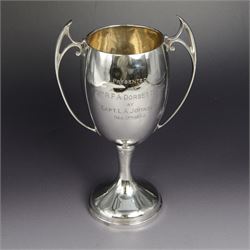 1930s silver twin handled trophy cup, with Art Nouveau style handled and presentation engr...