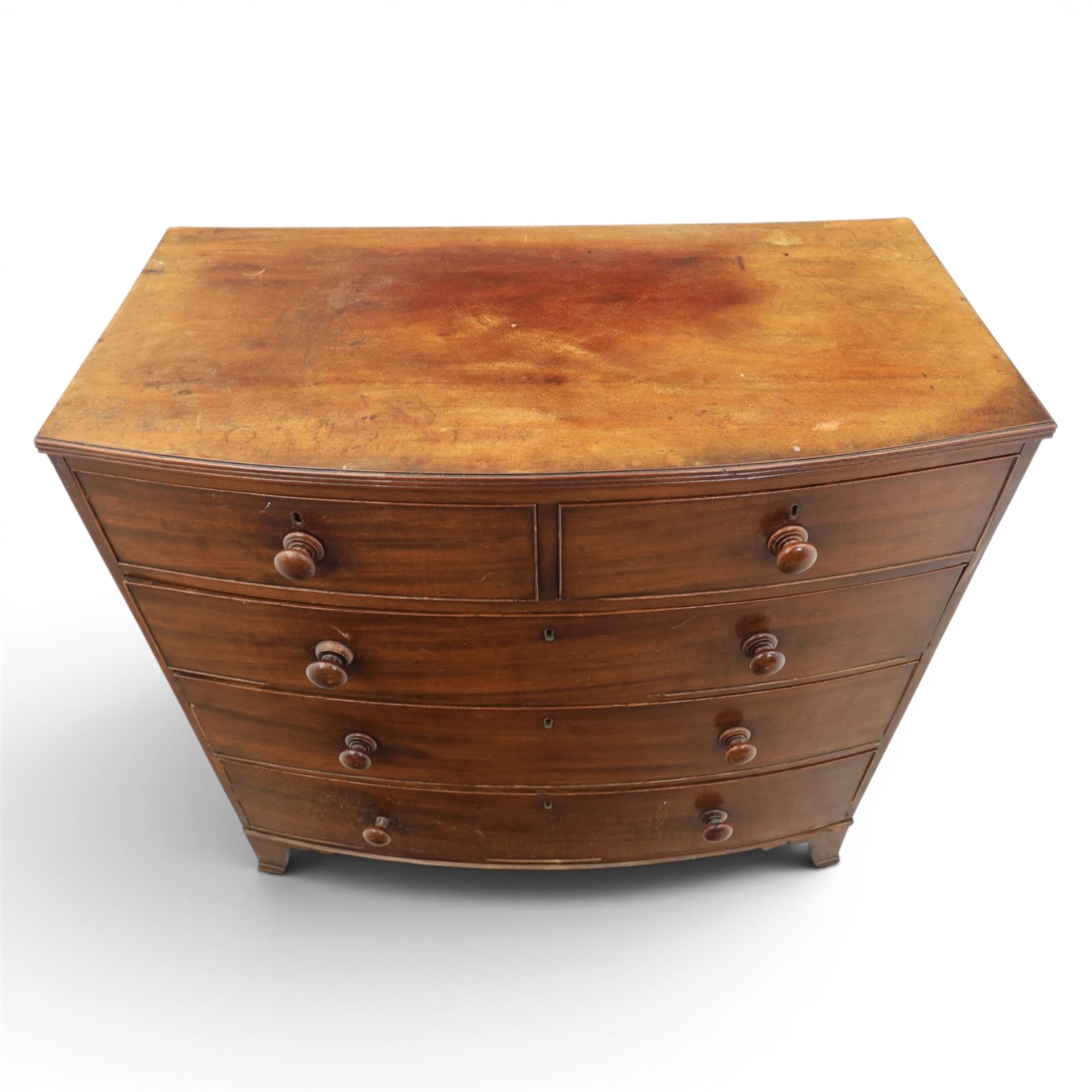 19th century bow fronted mahogany chest, two short over three graduating drawers, raised on bracket feet