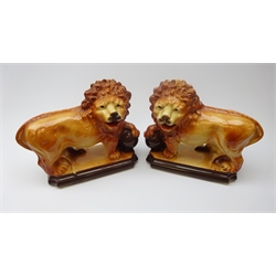  Pair Staffordshire style lions, L35cm   