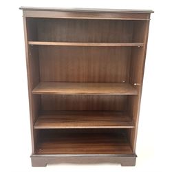 Small inlaid mahogany bookcase, three adjustable shelves, plinth base