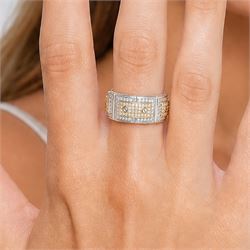 Platinum and 18ct gold diamond ring, eight platinum panels pave set with diamonds, linked by four diamond set horizontal panels, each with screw decoration, total diamond weight approx 2.80 carat