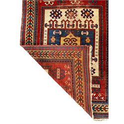 Small Turkish rug, repeating geometric pattern border