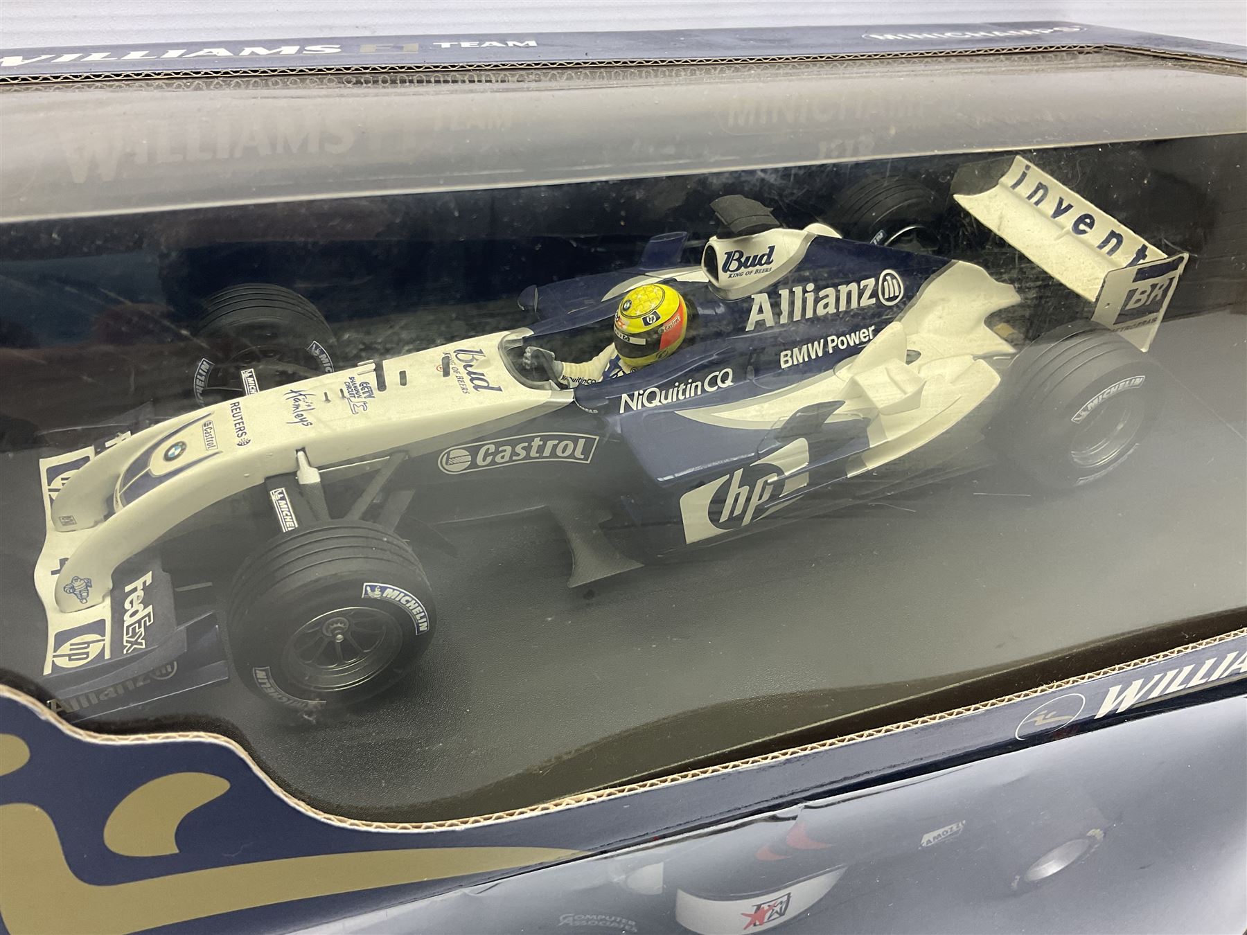 Four Minichamps 1:18 scale die-cast racing cars - Williams F1 Team BMW FW26 R. Schumacher; McLaren Mercedes MP4-12 D. Coulthard; McLaren Mercedes MP4-13 M. Hakkinen; and Formel 1 Jordan peugeot EJR 195 E. Irvine; all boxed (4)