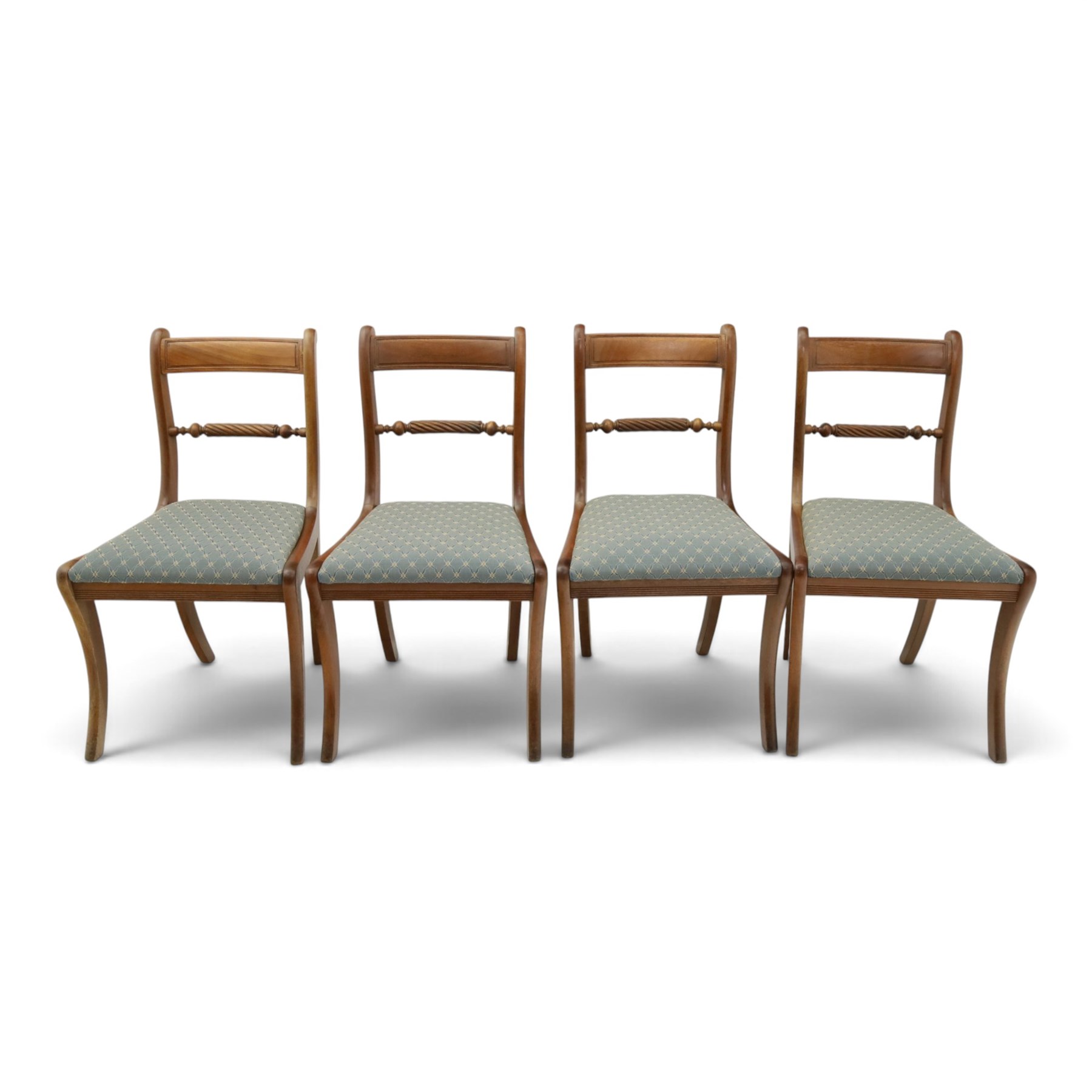 19th century mahogany extending dining table, rectangular top with rounded corners raised on turned and fluted supports with brass cups and castors, with two additional leaves; with set of eight (6+2) Regency design mahogany dining chairs, spiral-reeded back-bar over drop-in seats and sabre supports (W54cm H85cm)