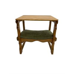 Mid-20th century oak metamorphic table chair, the hinged and side back carved with scrolling foliage, on shaped uprights joined by stretchers