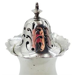 Edwardian silver sugar caster, of plain bellied form with 'frilled' rim, and removable pierced cover, upon three pad feet, hallmarked Pearce & Son, Chester 1909, H14.5cm, approximate weight 6.07 ozt (189 grams)