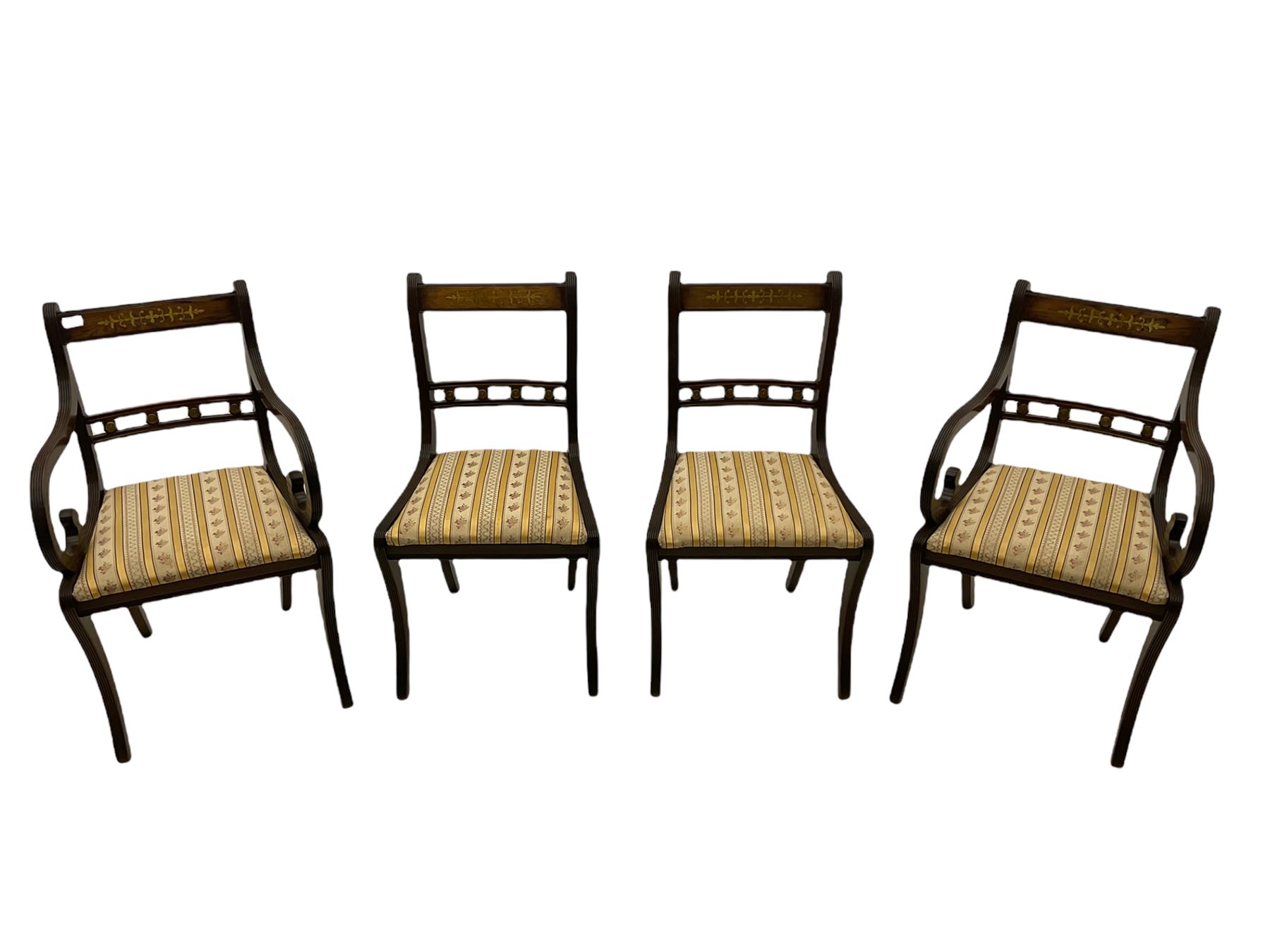 Set of eight Regency style mahogany dining chairs, brass inlay with gilded detail