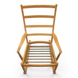 Parker Knoll -model '480' rocking beechwood chair, loose seat cushions above an elasticated webbing seat, curved rocker base 