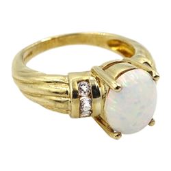9ct gold opal and white sapphire ring, hallmarked