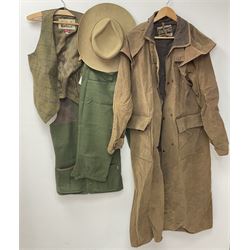 Ladies Musto 'Sporting Ladies' tweed waistcoat and breeks, size 10, together with a ladies Barbour 'Sporting' tweed waistcoat, and a Driza-Bone full length riding coat, size M. (4). 