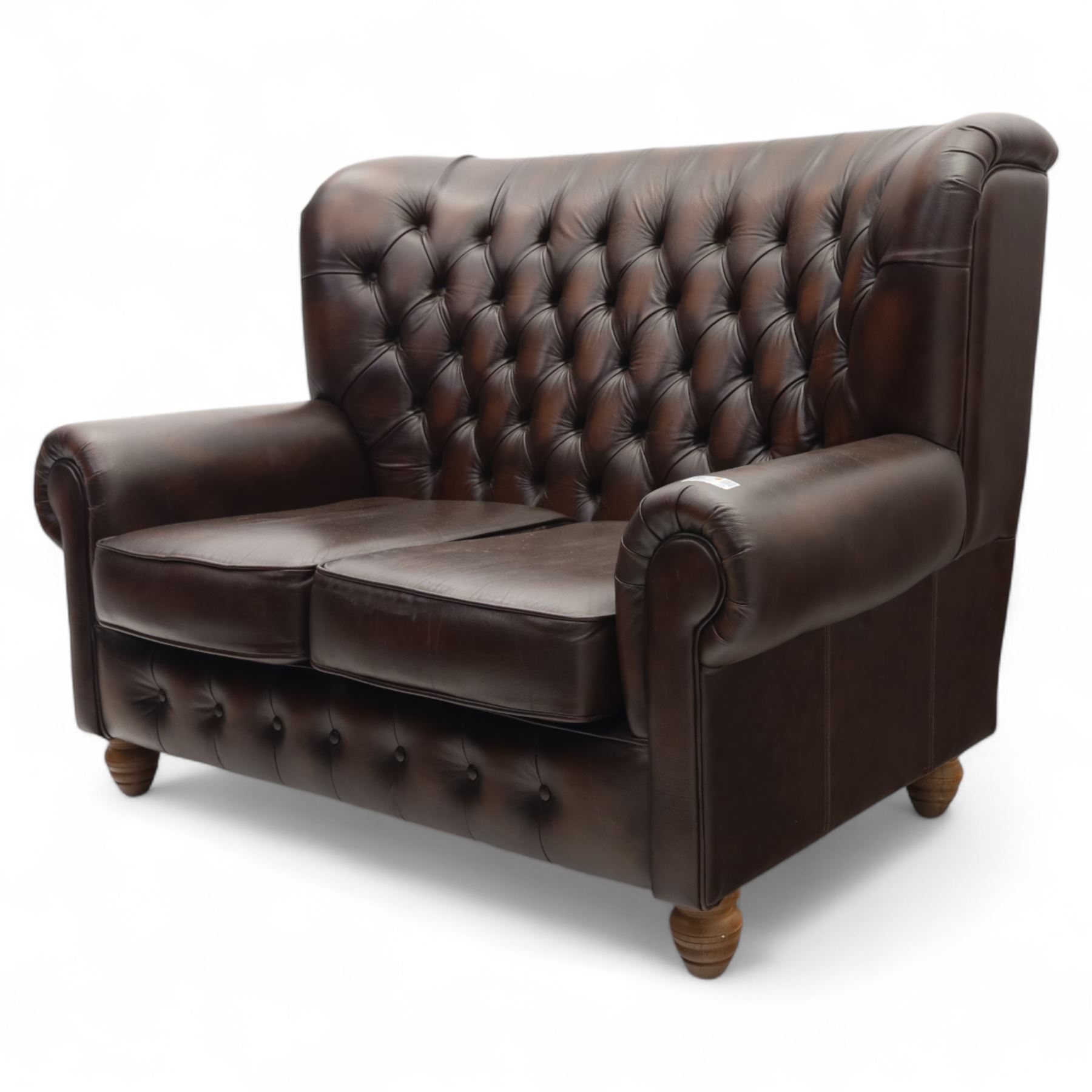 Thomas Lloyd  - two-seater settee, brown leather,  button upholstered back, cushion seats, and wide scrolled arms, raised on bun feet